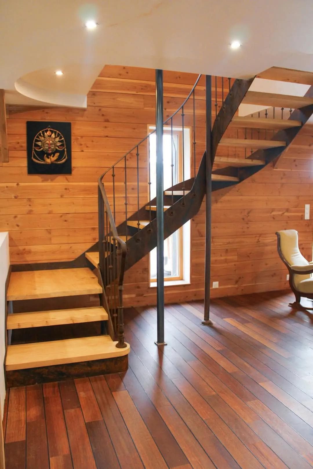 Escalier sur-mesure en fer forgé à l’effet rouille protégé par un vernis de finition